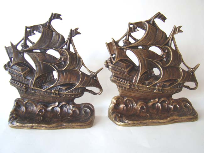A fine pair of solid brass bookends circa 1920 depicting a 17th century Galleon