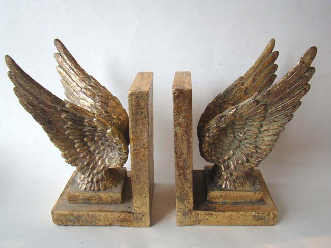 An attractive pair of contemporary gilded wings bookends