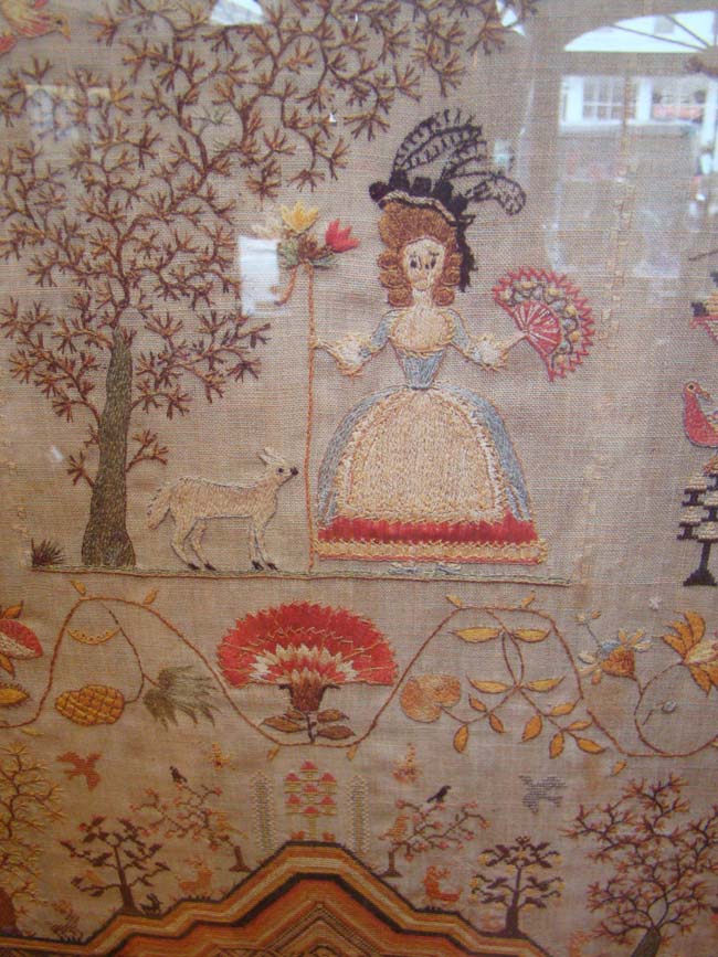 A fine reproduction of "Jane Ballard's Sampler, Aged 10, 1799"