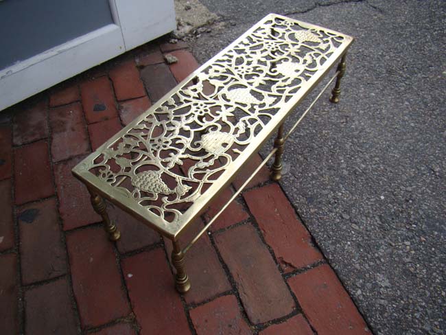 A fine all brass Victorian fireplace trivet circa 1860-1890 in the beehive and grape vine pattern — image 2