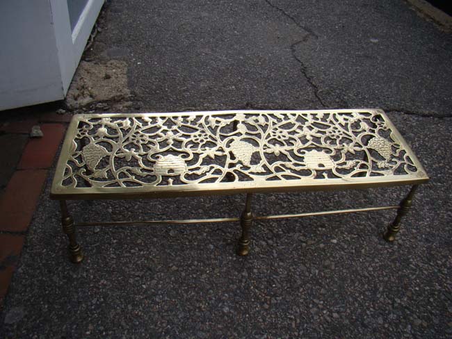 A fine all brass Victorian fireplace trivet circa 1860-1890 in the beehive and grape vine pattern — image 3