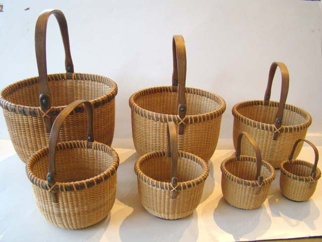 A wonderful vintage nest of seven Nantucket baskets circa 1970