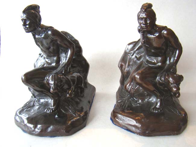 A pair of American Indian with hunting dog bookends by Jennings Brothers of Bridgeport, CT., circa 1930