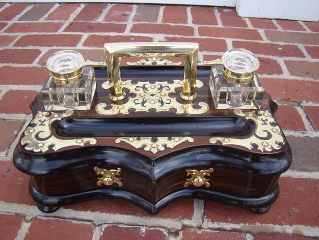 A magnificent English brass mounted coromandel wood inkstand circa 1860