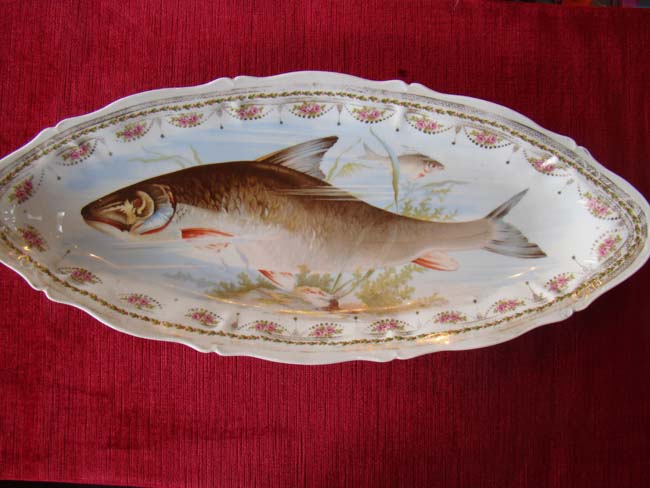 A beautiful Austrian bone china serving platter circa 1880-1900 with hand painted depiction of a salmon