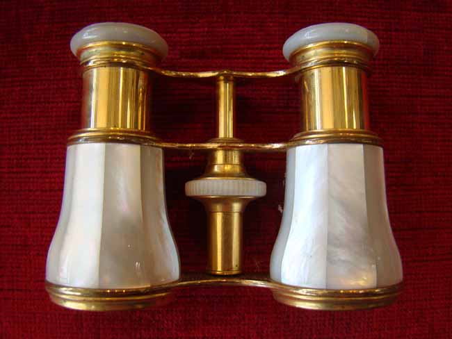 A fine pair of French 19th century mother-of-pearl mounted opera glasses by Lematre Fi circa 1890