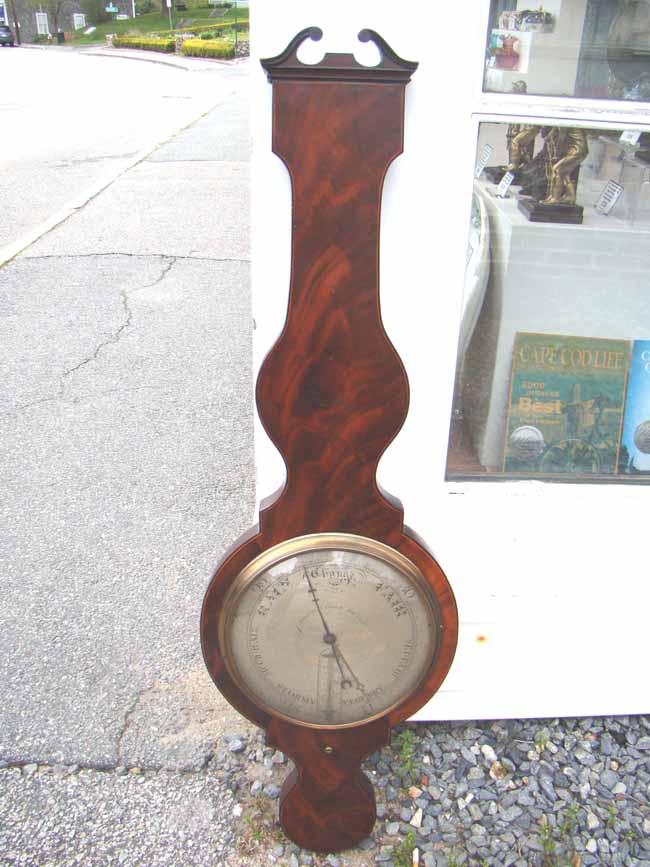 An exceptionally fine early 19th century English wheel barometer made by Joseph Somalvico circa 1835