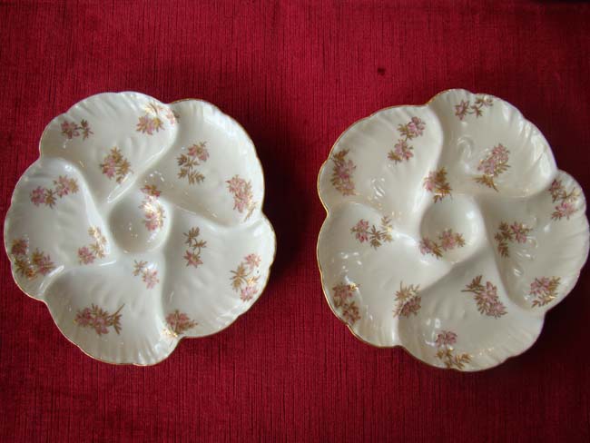 A fine pair of early Charles Havilland Limoges china oyster plates dating to 1882