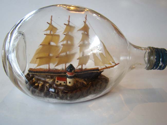 A vintage three-masted ship in a Haig Whiskey bottle circa 1940