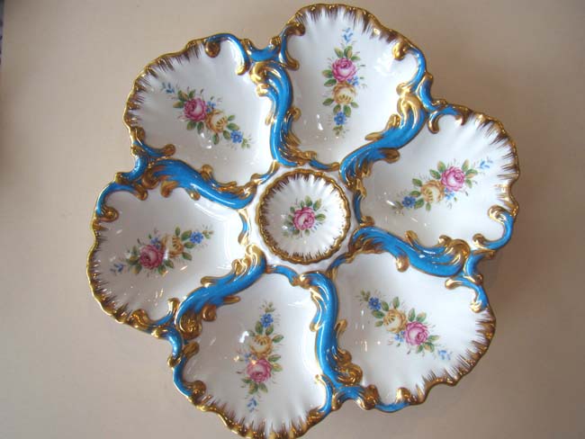 An extremely beautiful hand painted vintage Limoges oyster plate circa 1900