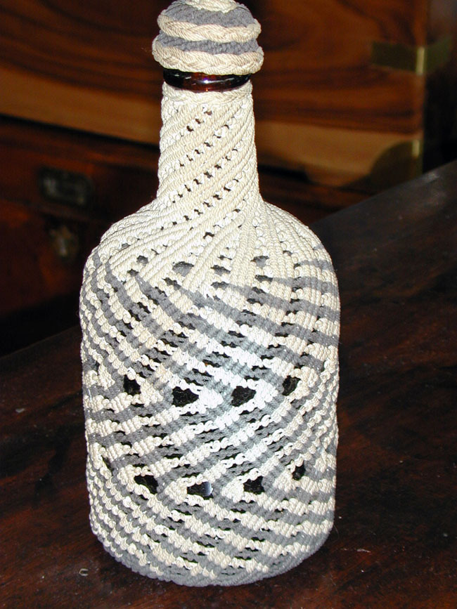 19th century Bottle with sailor's Macrame work