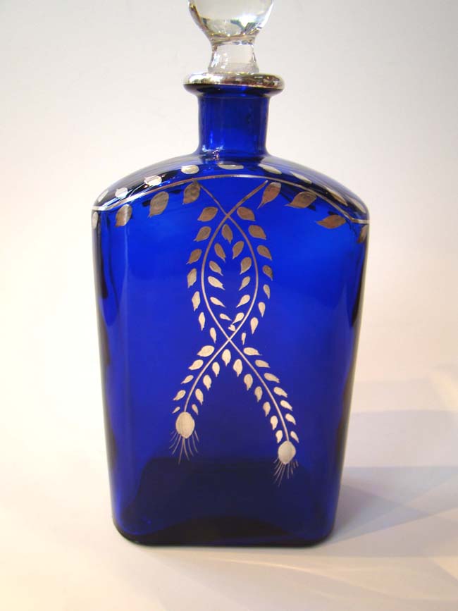A gorgeous vintage  cobalt blue glass flask/decanter with silver overlay