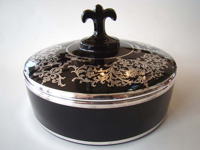 A stunning vintage silver overlay black glass candy dish circa 1910