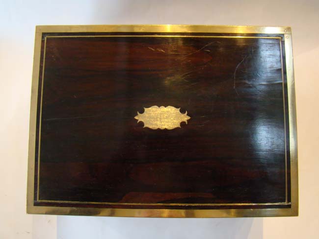 A fine English brass mounted rosewood "Campaign" style gentleman's dressing/toiletry box with sterling silver contents dated 1827. — image 3
