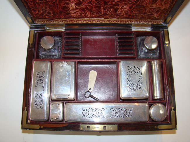 A fine English brass mounted rosewood "Campaign" style gentleman's dressing/toiletry box with sterling silver contents dated 1827. — image 2
