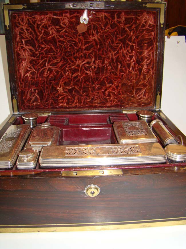 A fine English brass mounted rosewood "Campaign" style gentleman's dressing/toiletry box with sterling silver contents dated 1827. — image 4