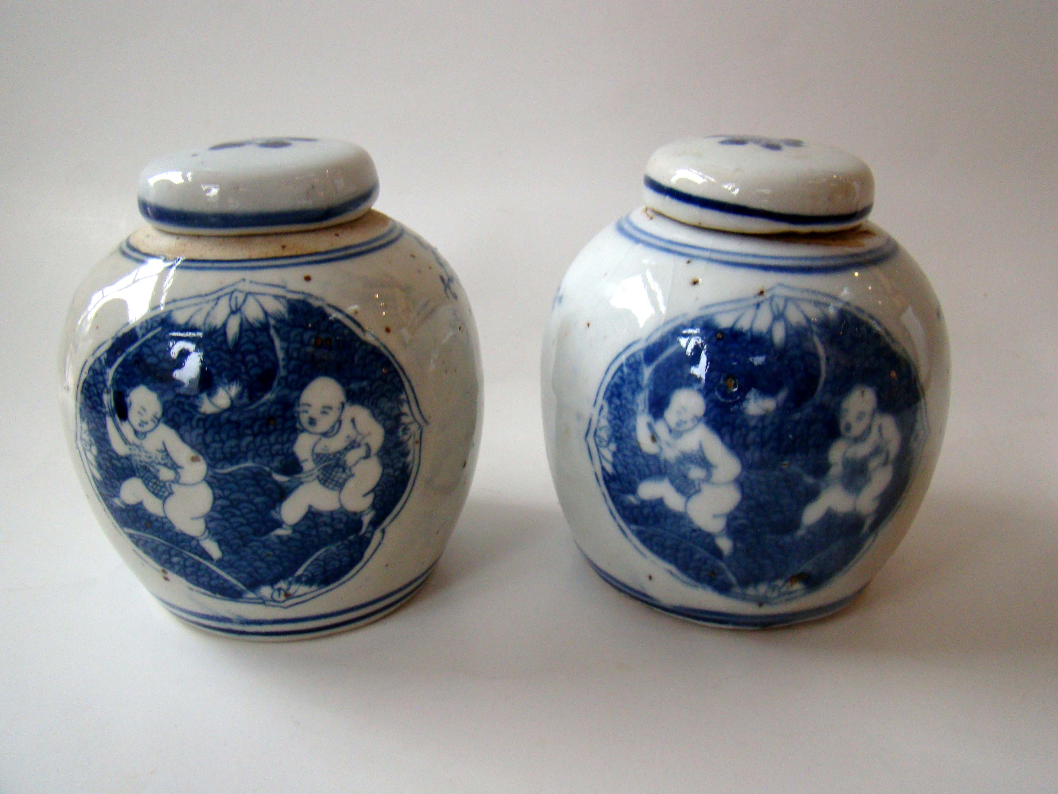 A charming pair of miniature Chinese ginger jars with children playing