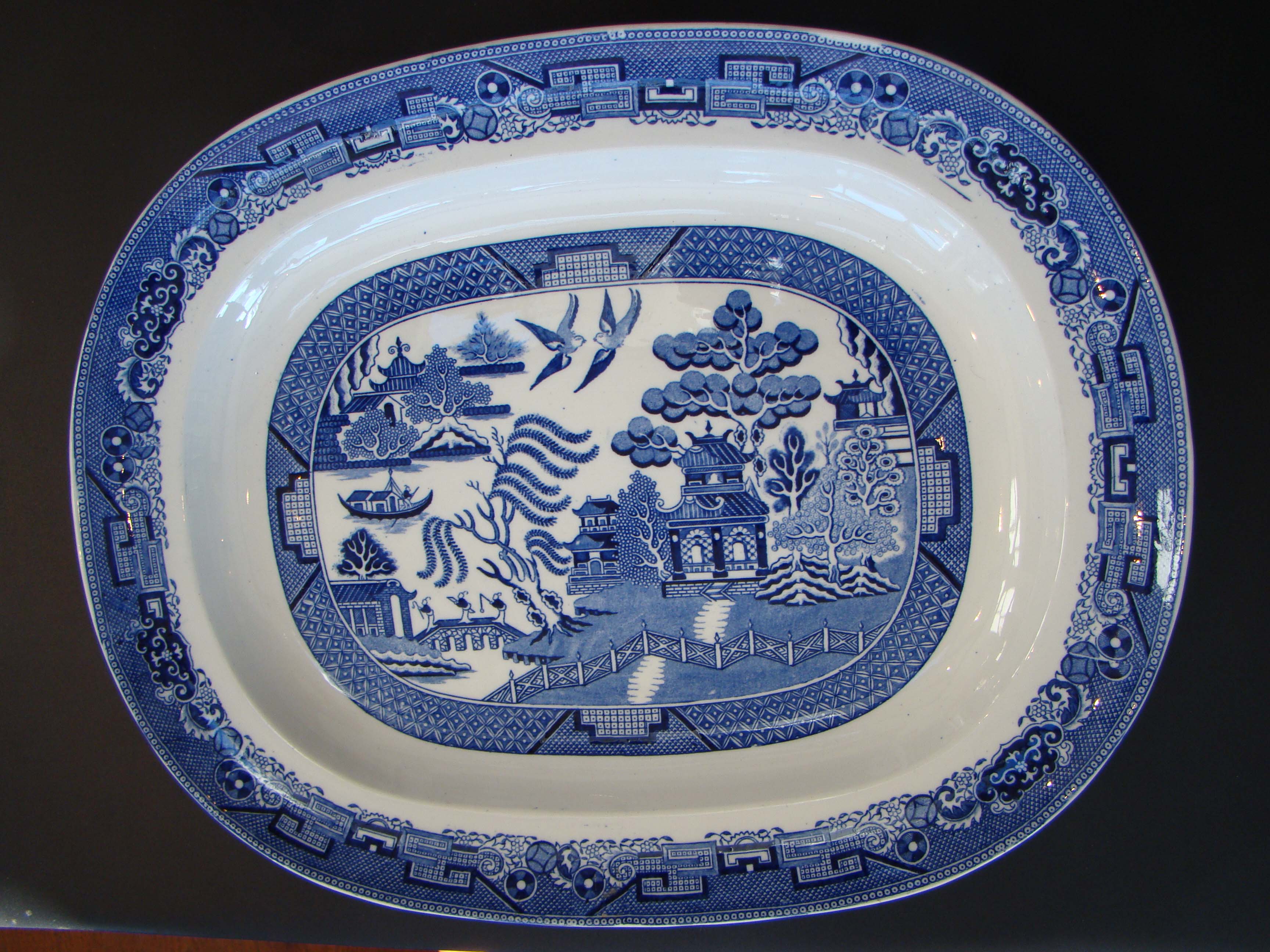 An exceptionally large and heavy 19th century Blue Willow serving platter