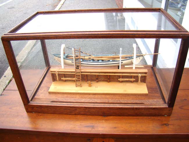 A very fine whaleboat model secured by davits to the hull of a whaling ship — image 6