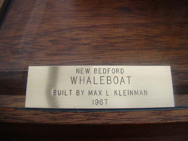 A very fine whaleboat model secured by davits to the hull of a whaling ship — image 7