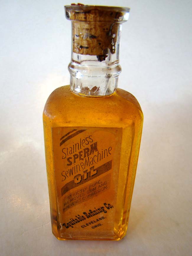A fine bottle of SPERM WHALE OIL with original cork and seal circa 1890