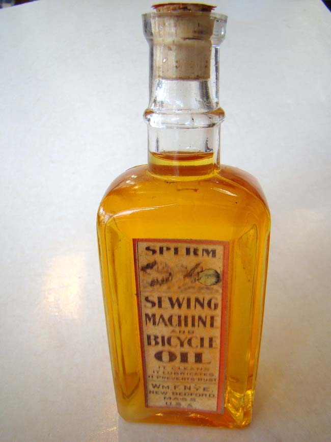 A fine bottle of SPERM WHALE OIL distributed by the William F. Nye Company of New Bedford, MA.