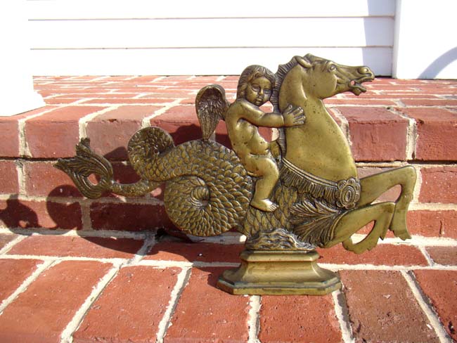 A fine and RARE pair of 19th century solid bronze Venetian Gondola Ornaments featuring a cherub riding a seahorse — image 2