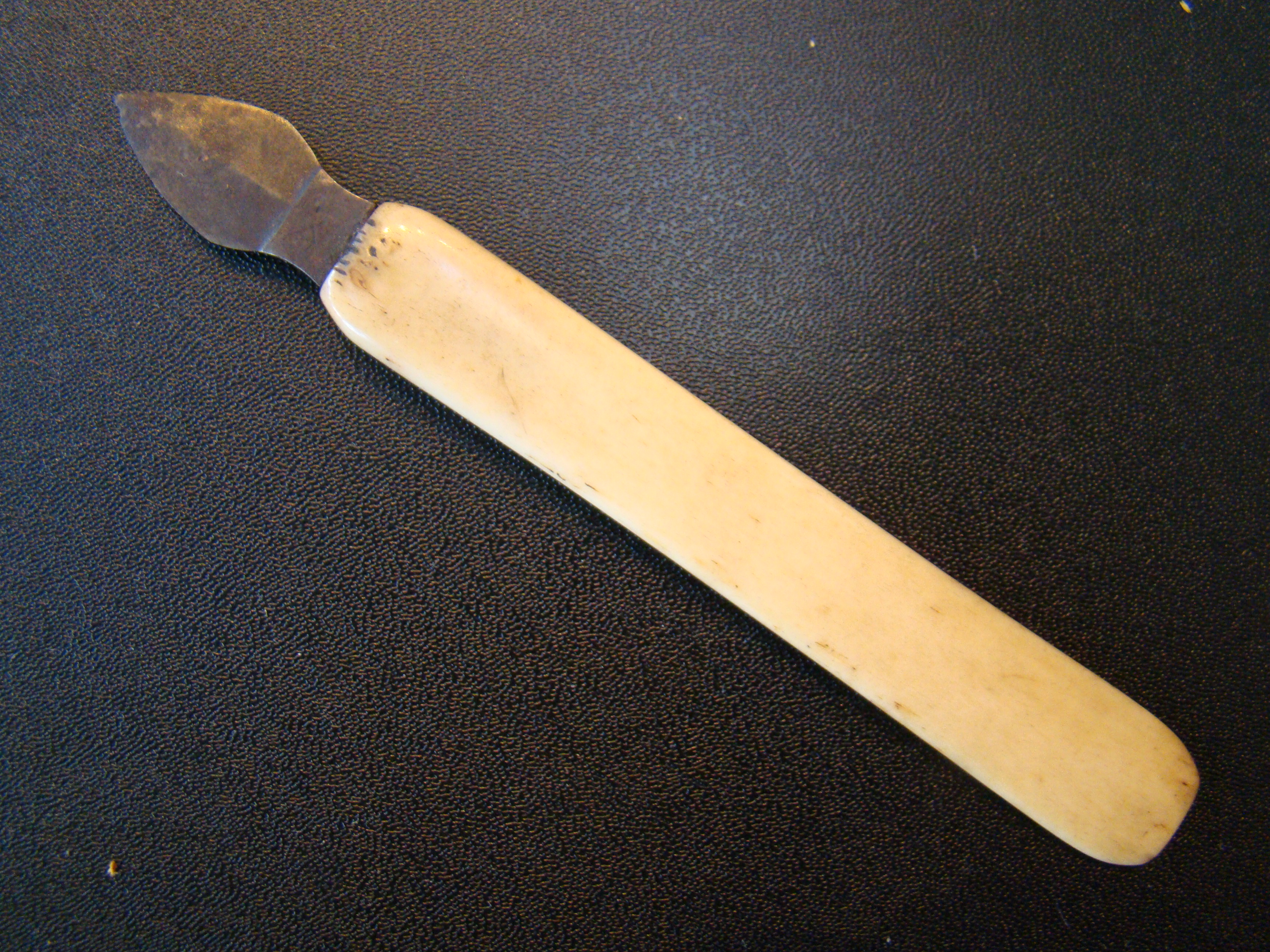 A 19th century whalebone mounted quill knife