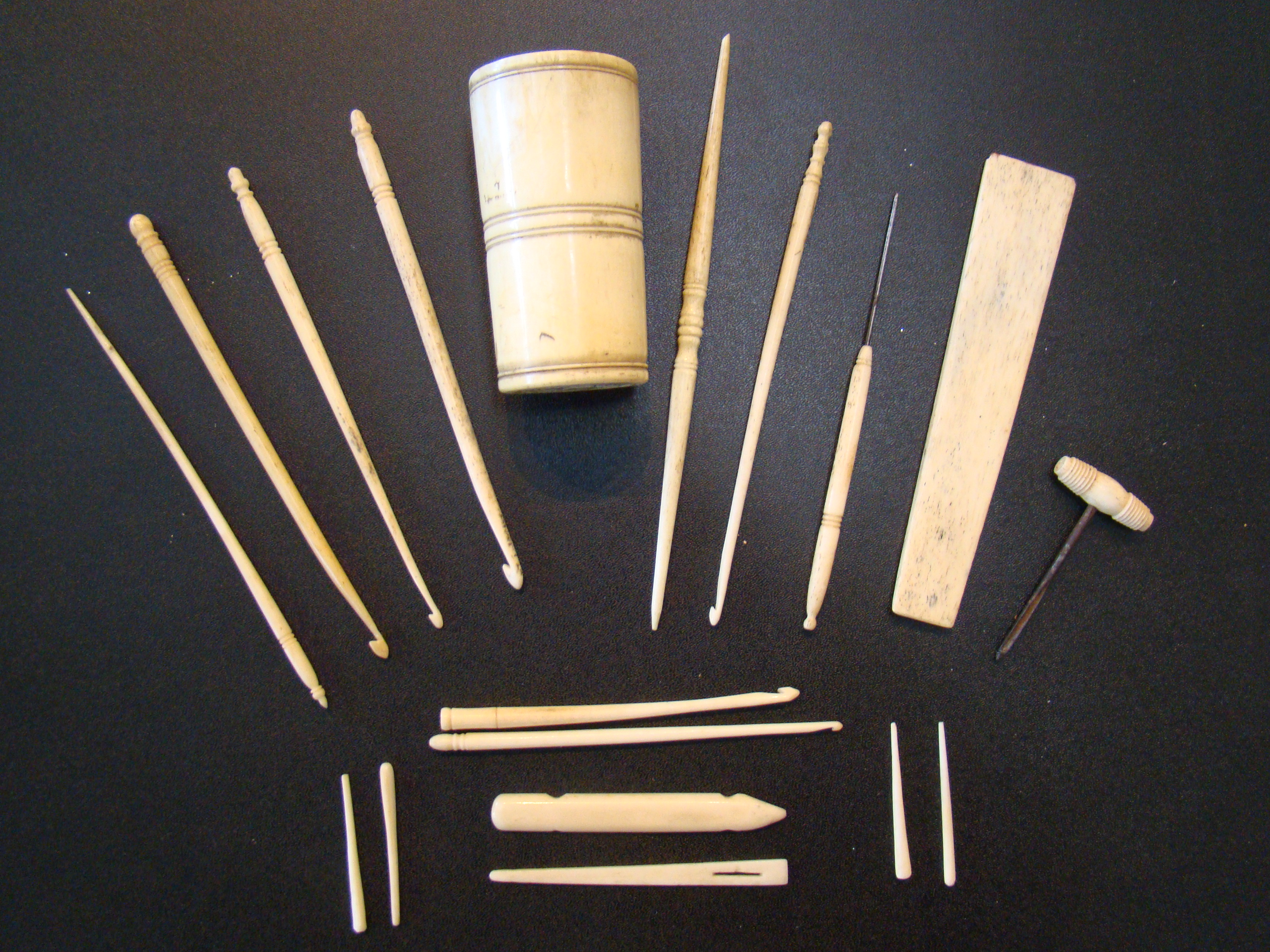 A group of 19th century whalebone sewing implements along with a whalebone cup — image 2