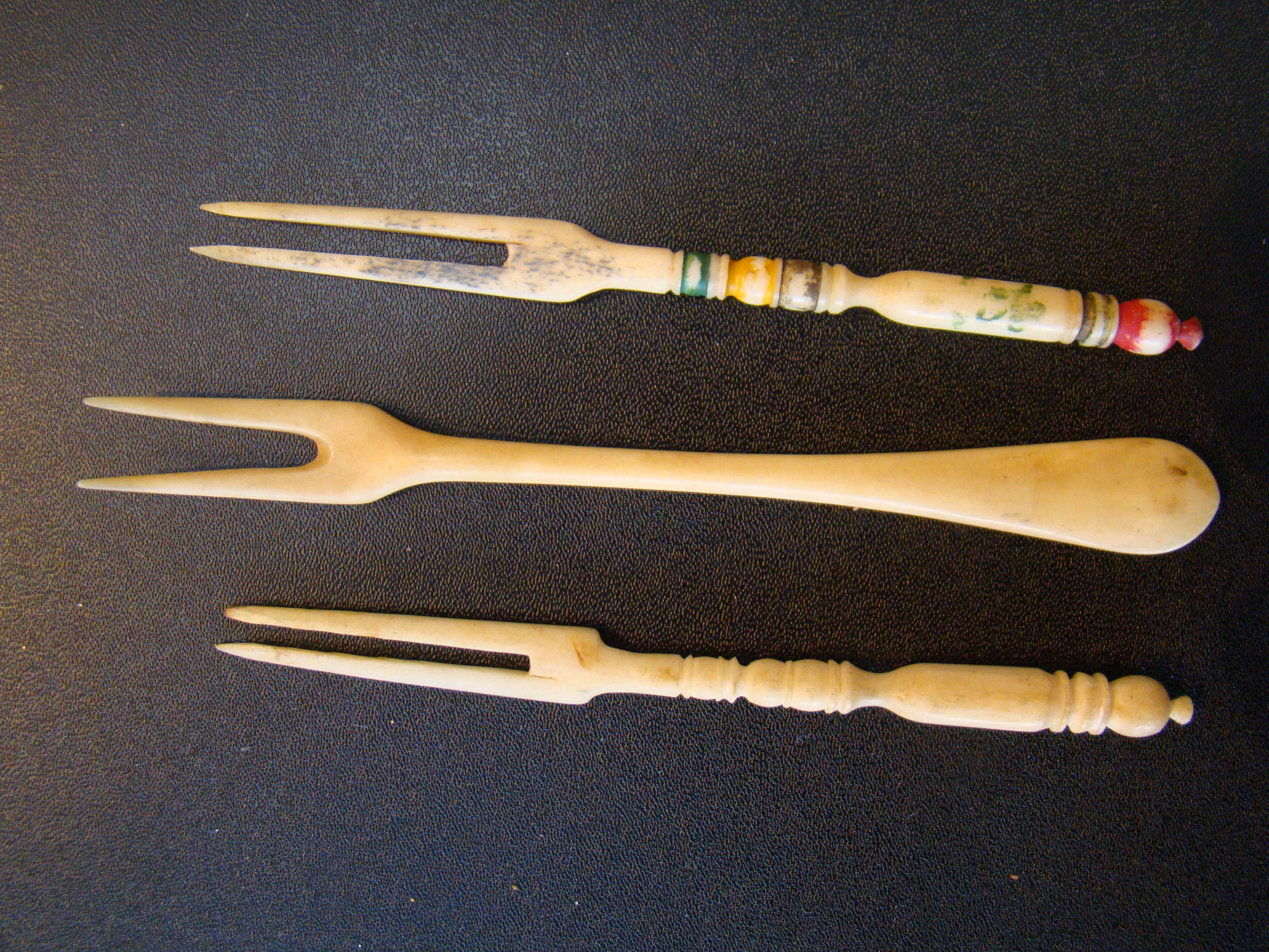 A group of three 19th century whalebone forks