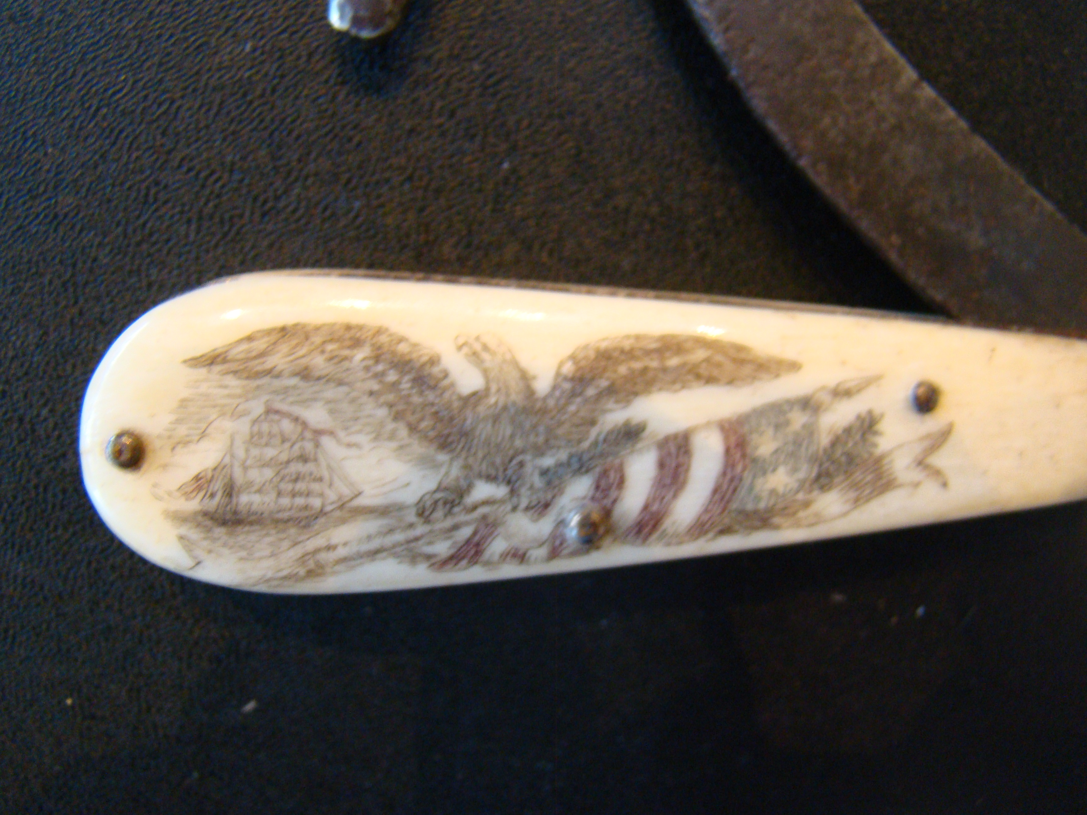 A FABULOUS 19th century sailor's folding tool with wonderful scrimshawed handle — image 2