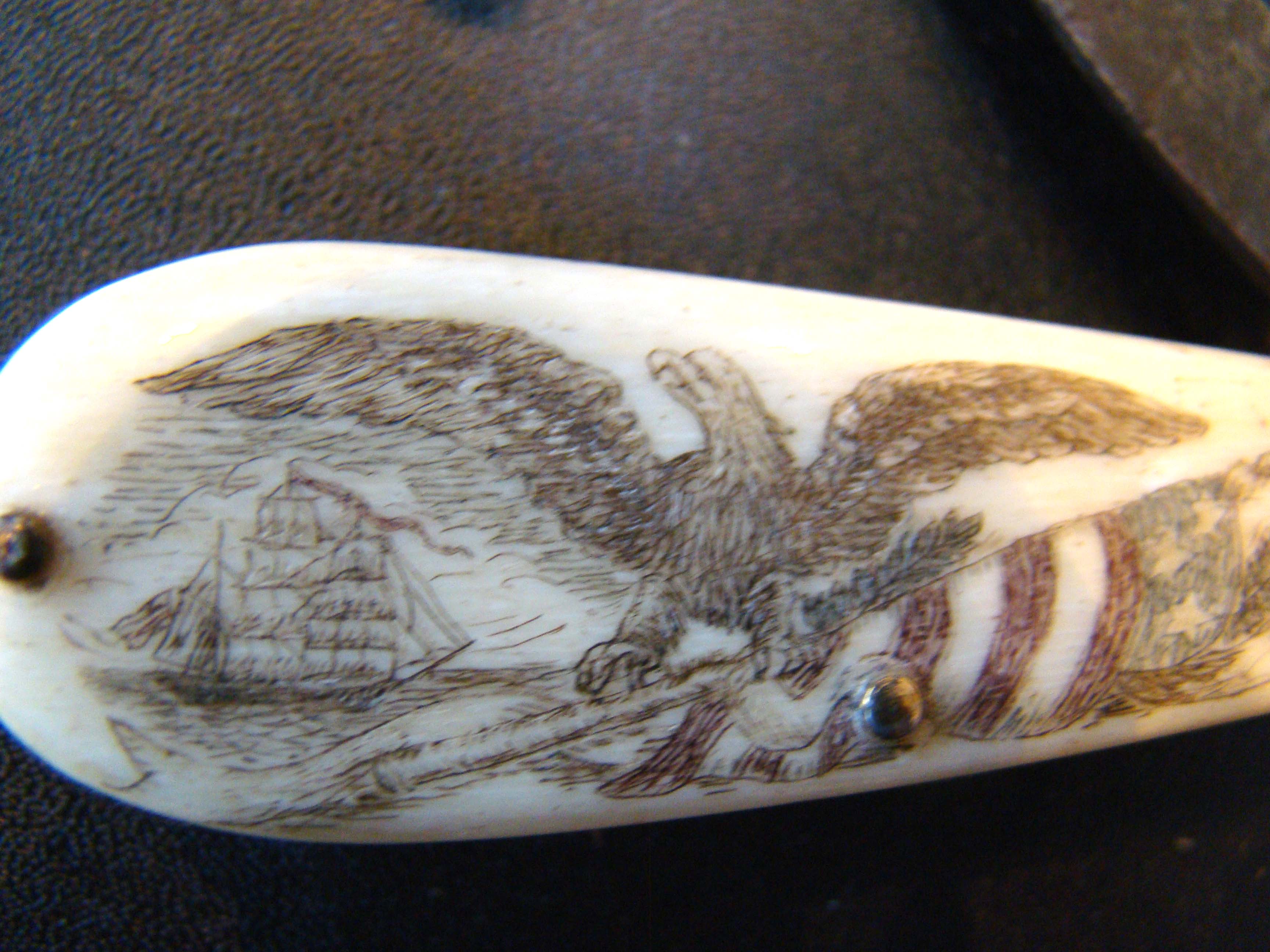 A FABULOUS 19th century sailor's folding tool with wonderful scrimshawed handle — image 4