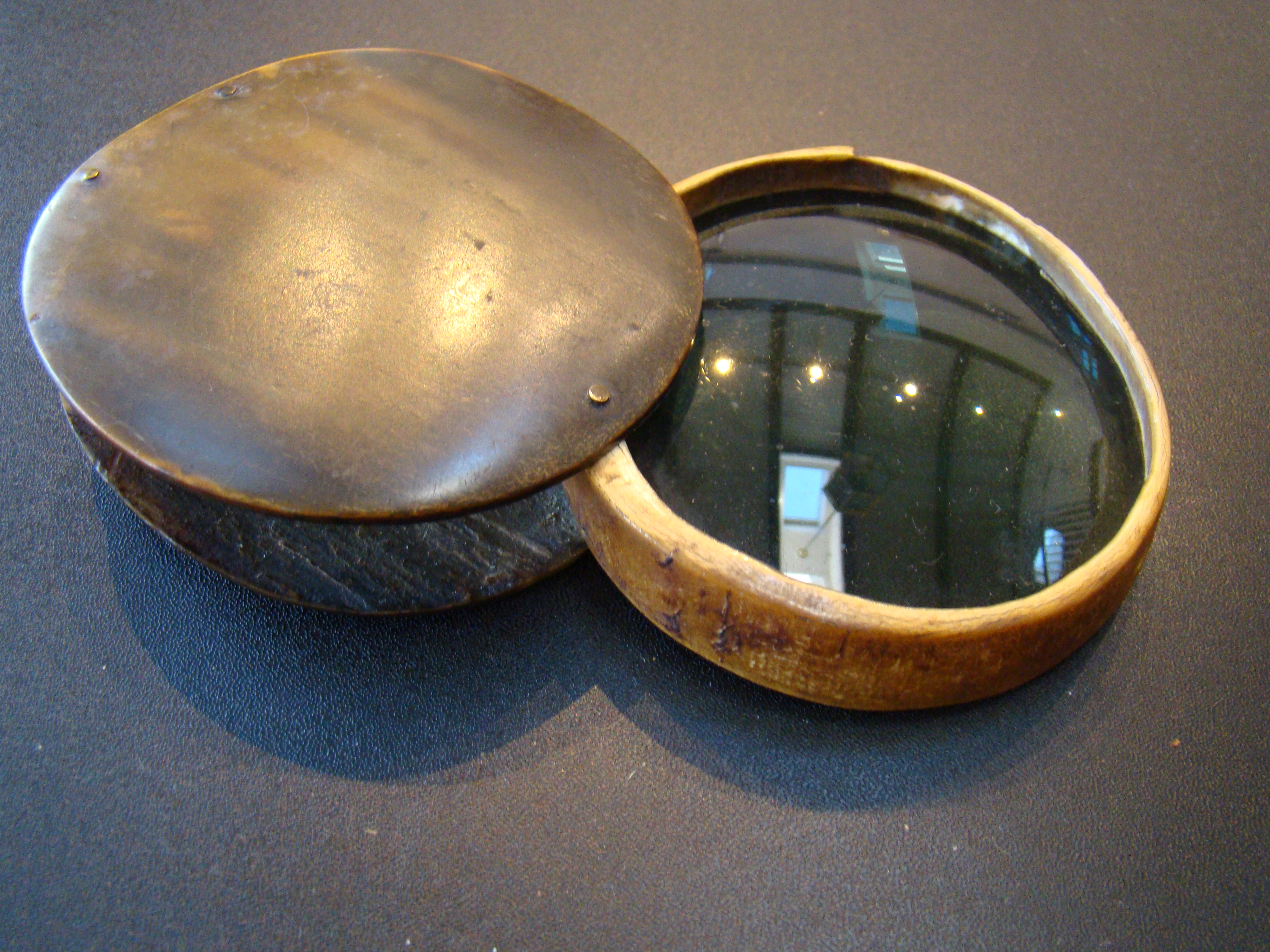 An early 18th century horn mounted magnifying glass circa 1720