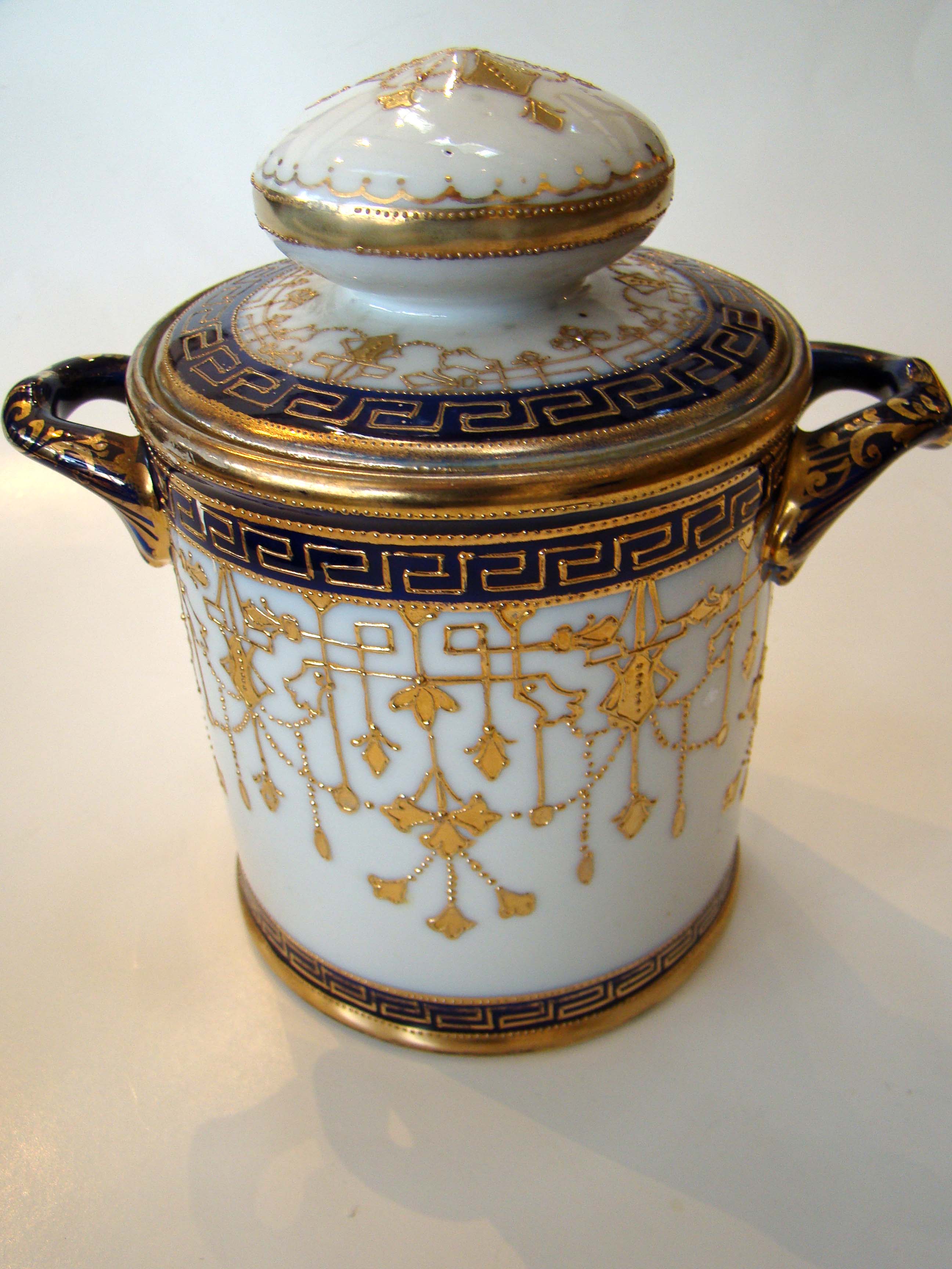 A visually stunning hand painted NIPPON covered jar circa 1900