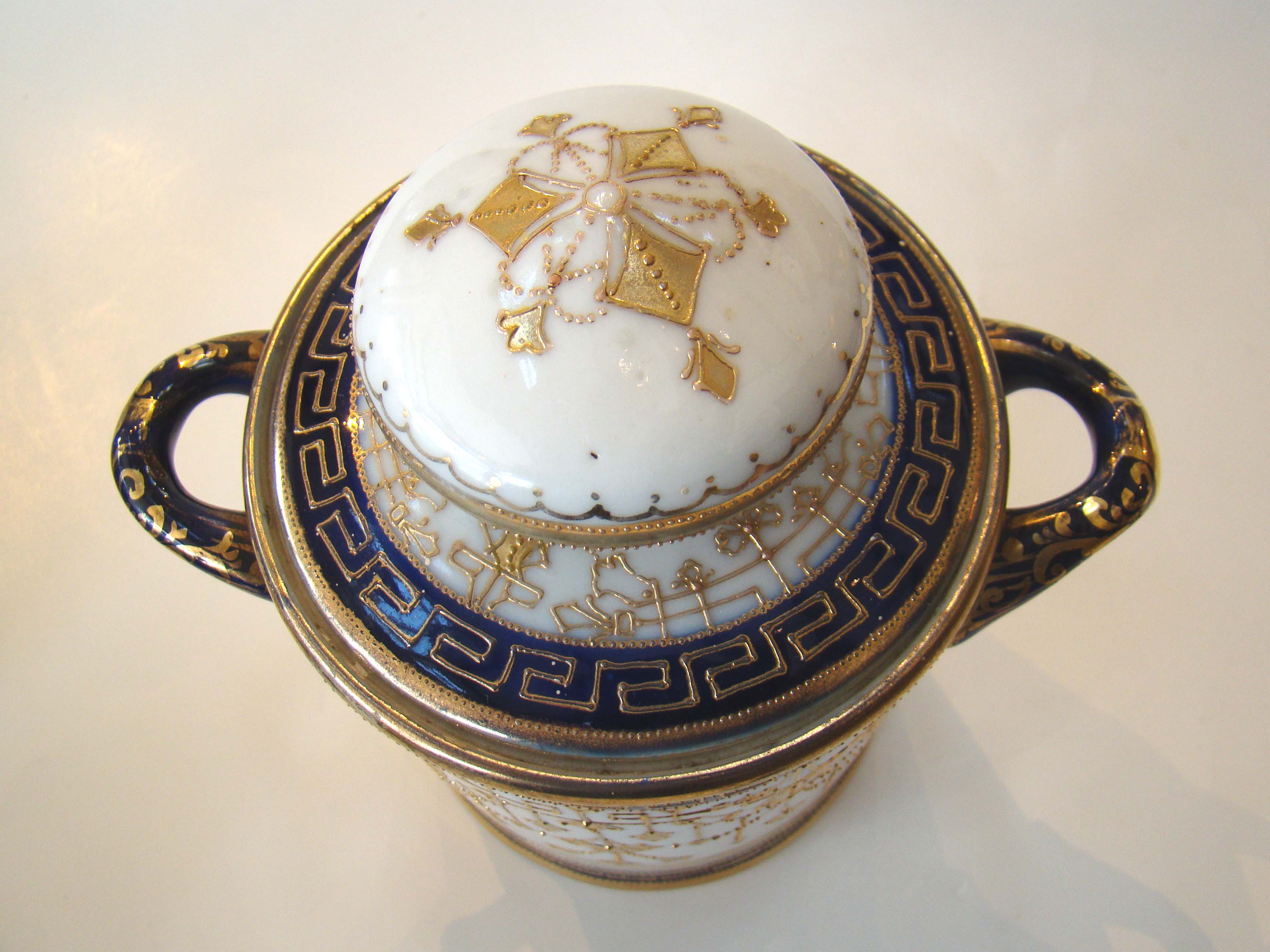 A visually stunning hand painted NIPPON covered jar circa 1900 — image 2