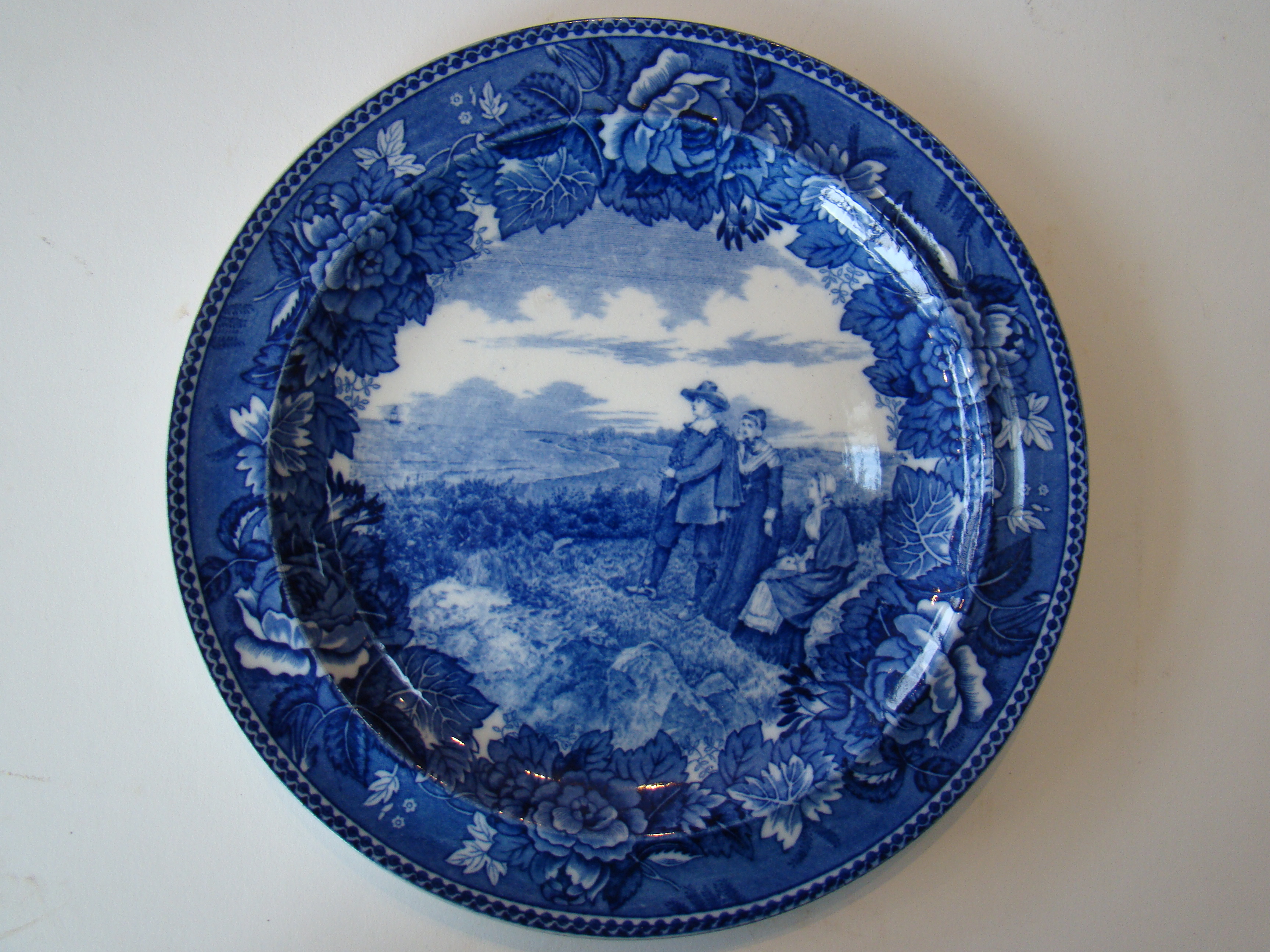 A fine late 19th century Wedgwood souvenir plate depicting the Courtship of Myles Standish--The Pilgrim Exiles.