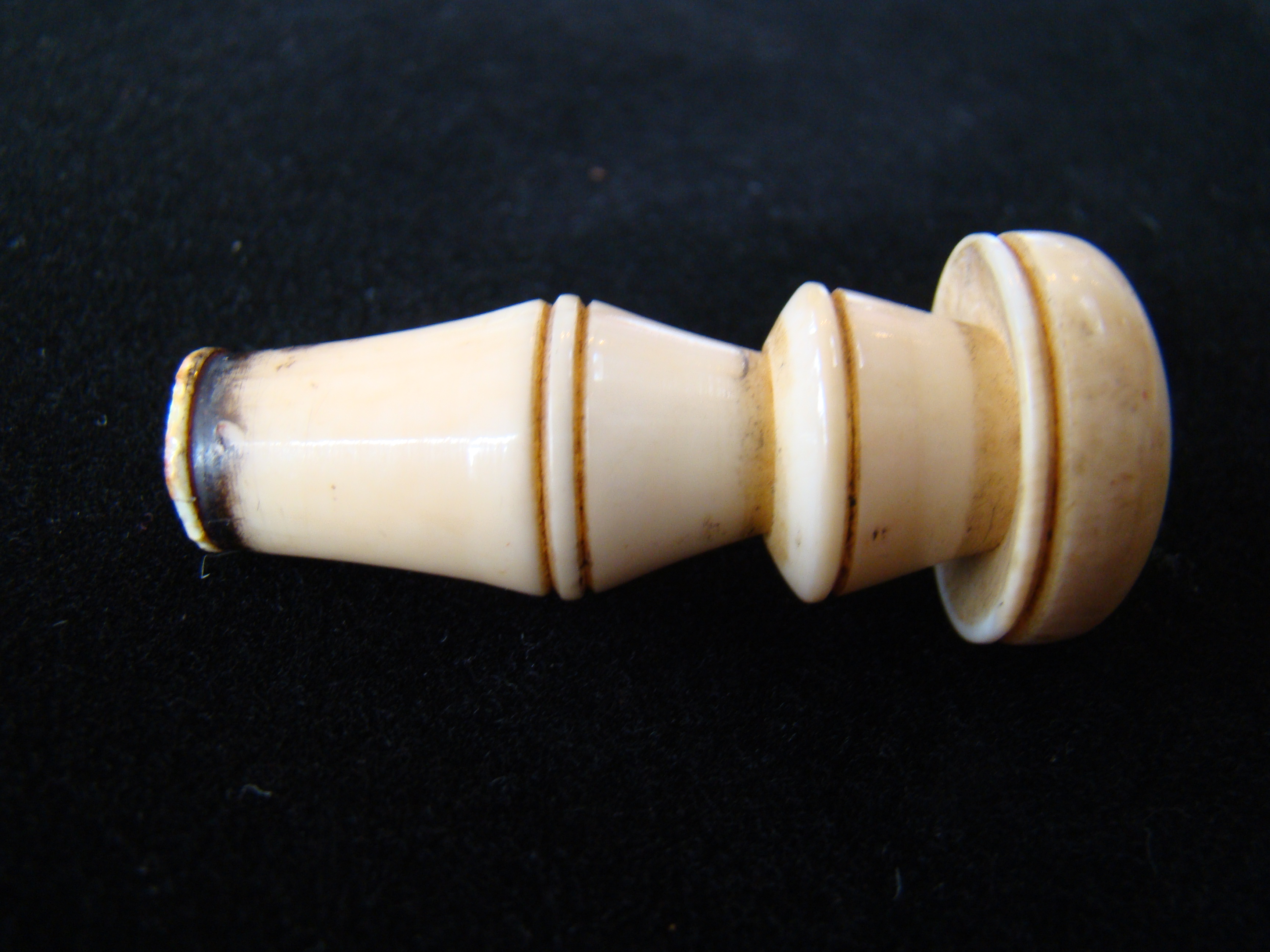A 19th century sailor-carved whale ivory sealing wax stamp with the initials 'E P' circa 1830