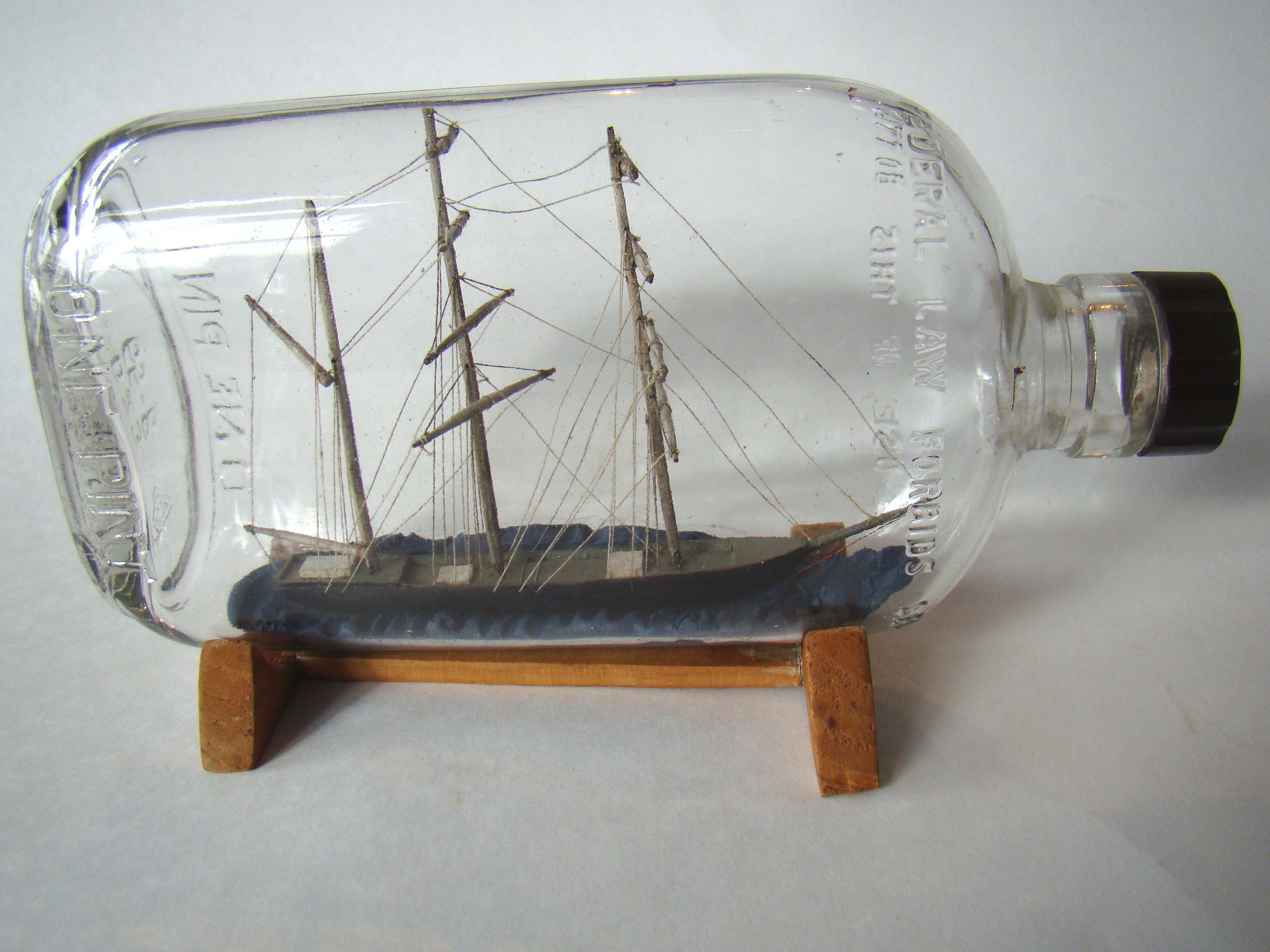 An early 20th century ship-in-a bottle