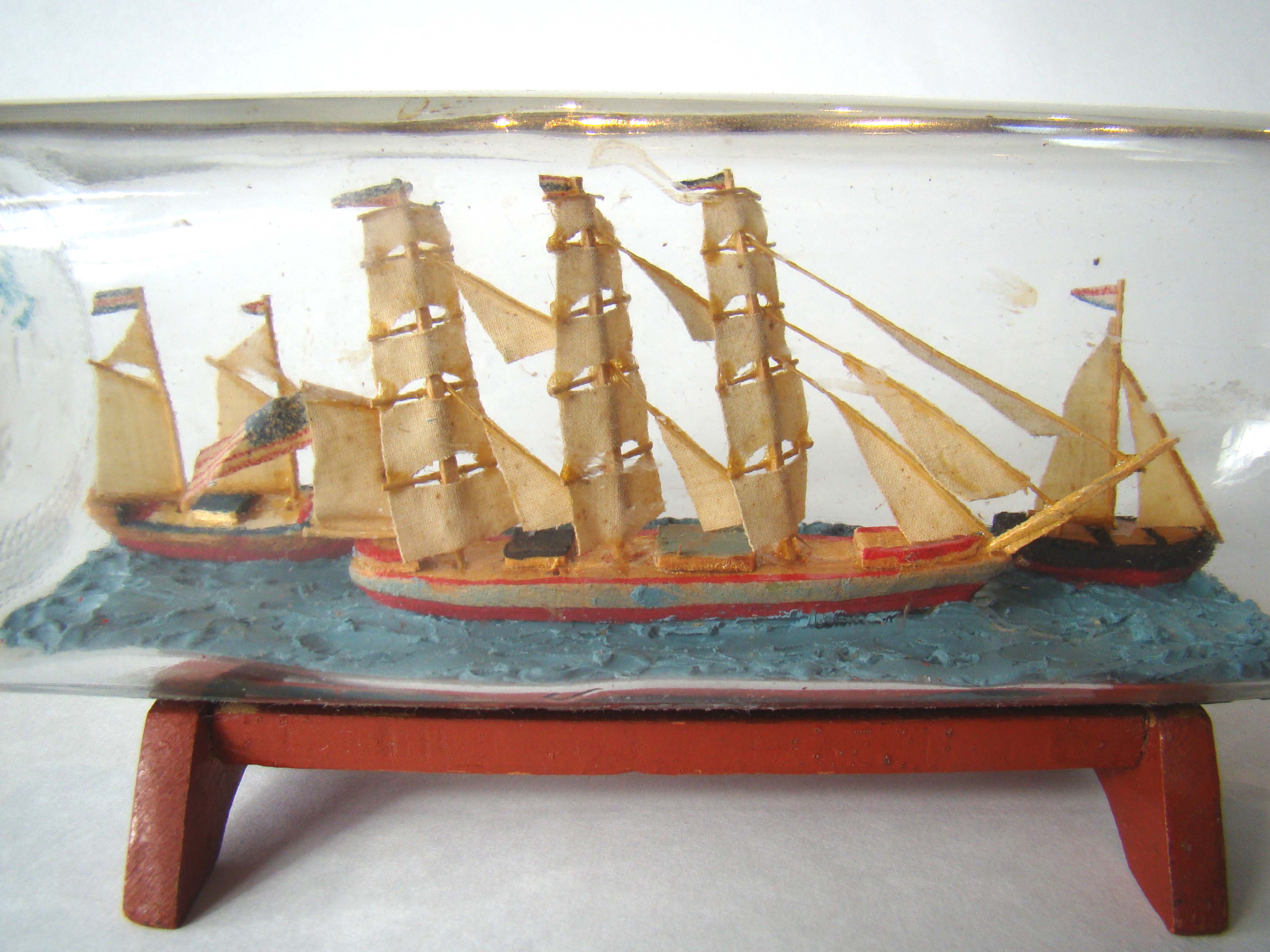 An early 20th century ship-in- bottle with 3 ships featured — image 2