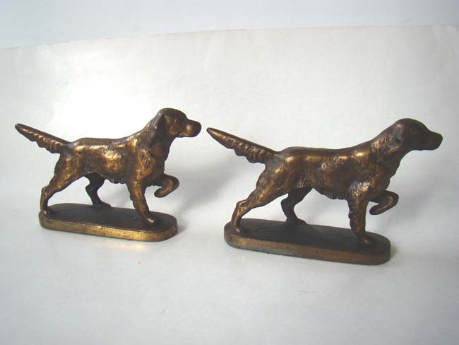 A pair of vintage solid brass dog bookends circa 1935