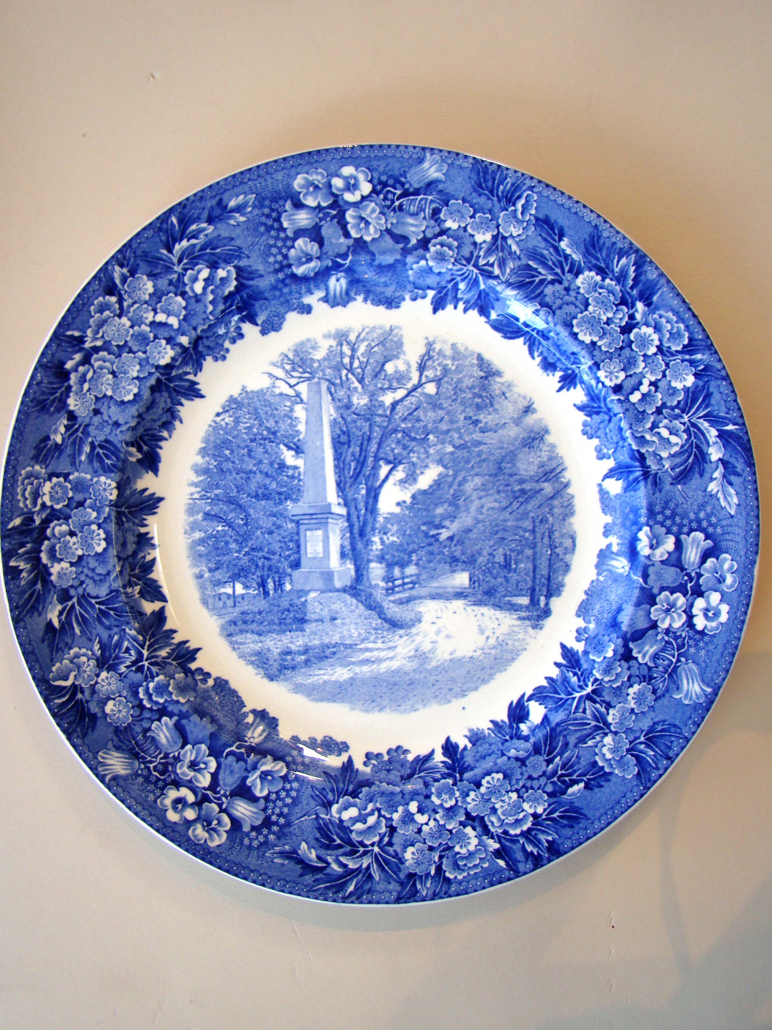 A fine vintage historical plate made by Wedgwood in 1900 depicting The Old North Bridge in Concord, Mass
