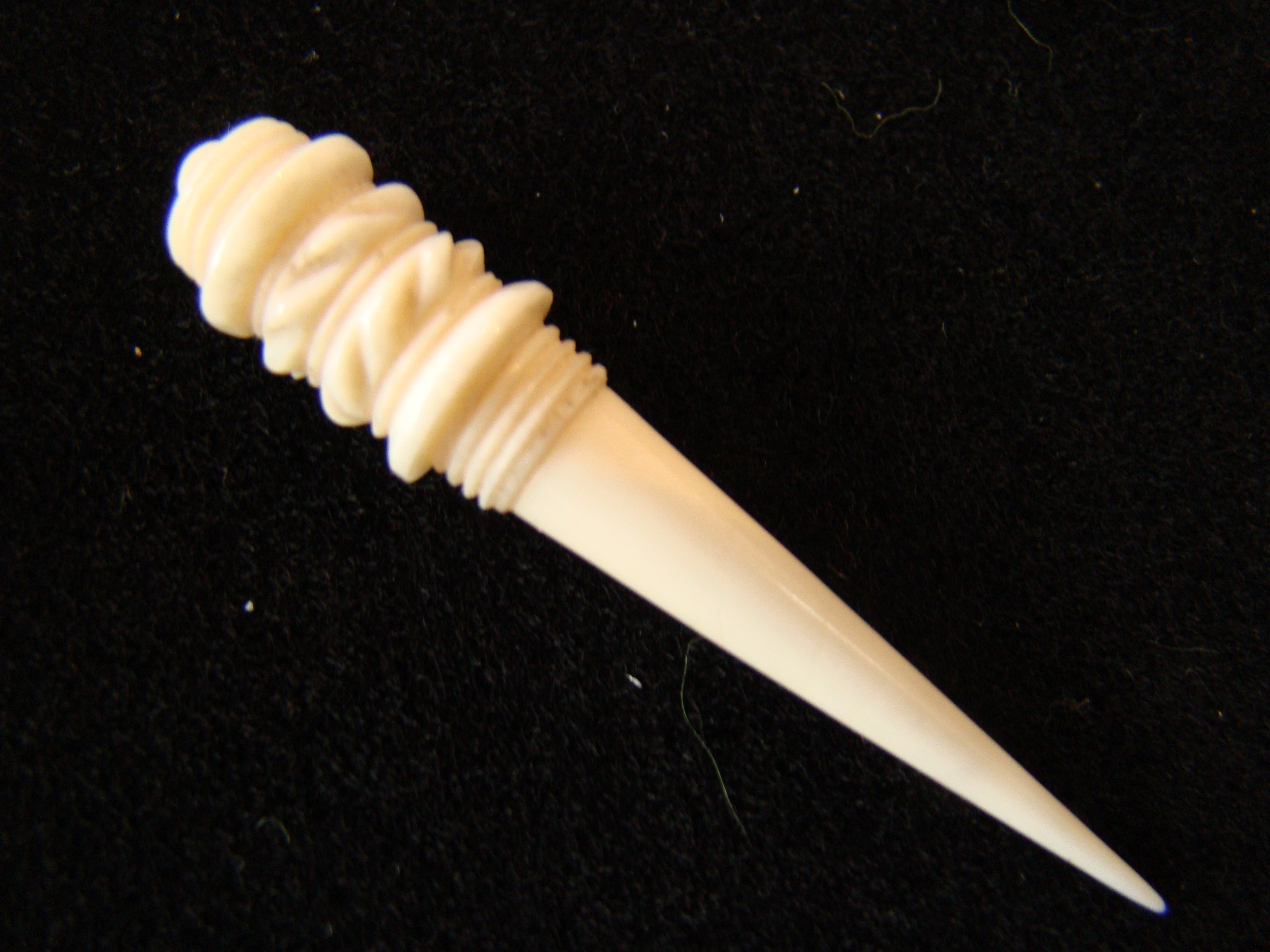 A beautiful small 19th century carved whalebone bodkin