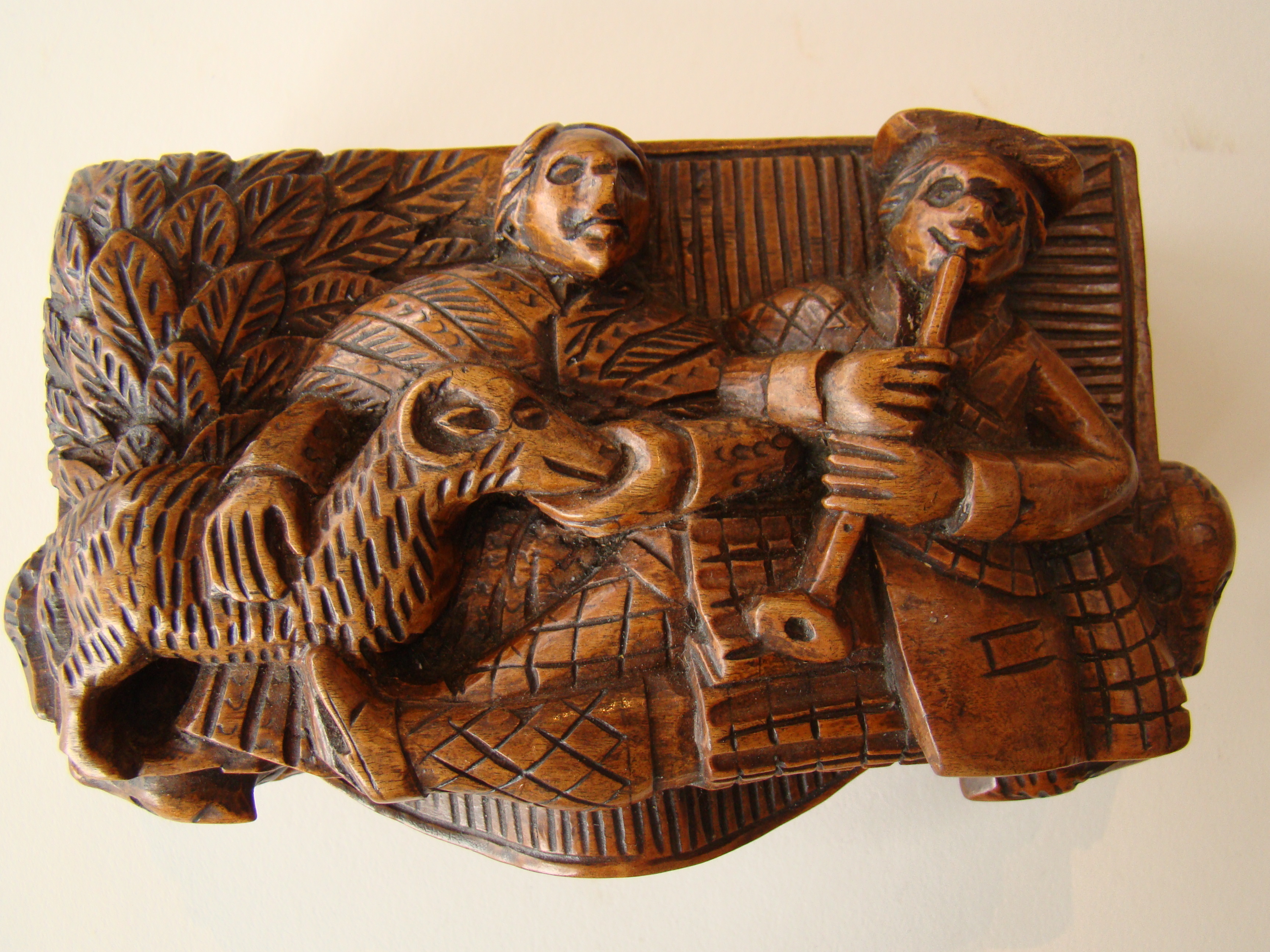 A fine early 19th century carved Scottish "Bobbie Burns" tobacco box circa 1796-1810
