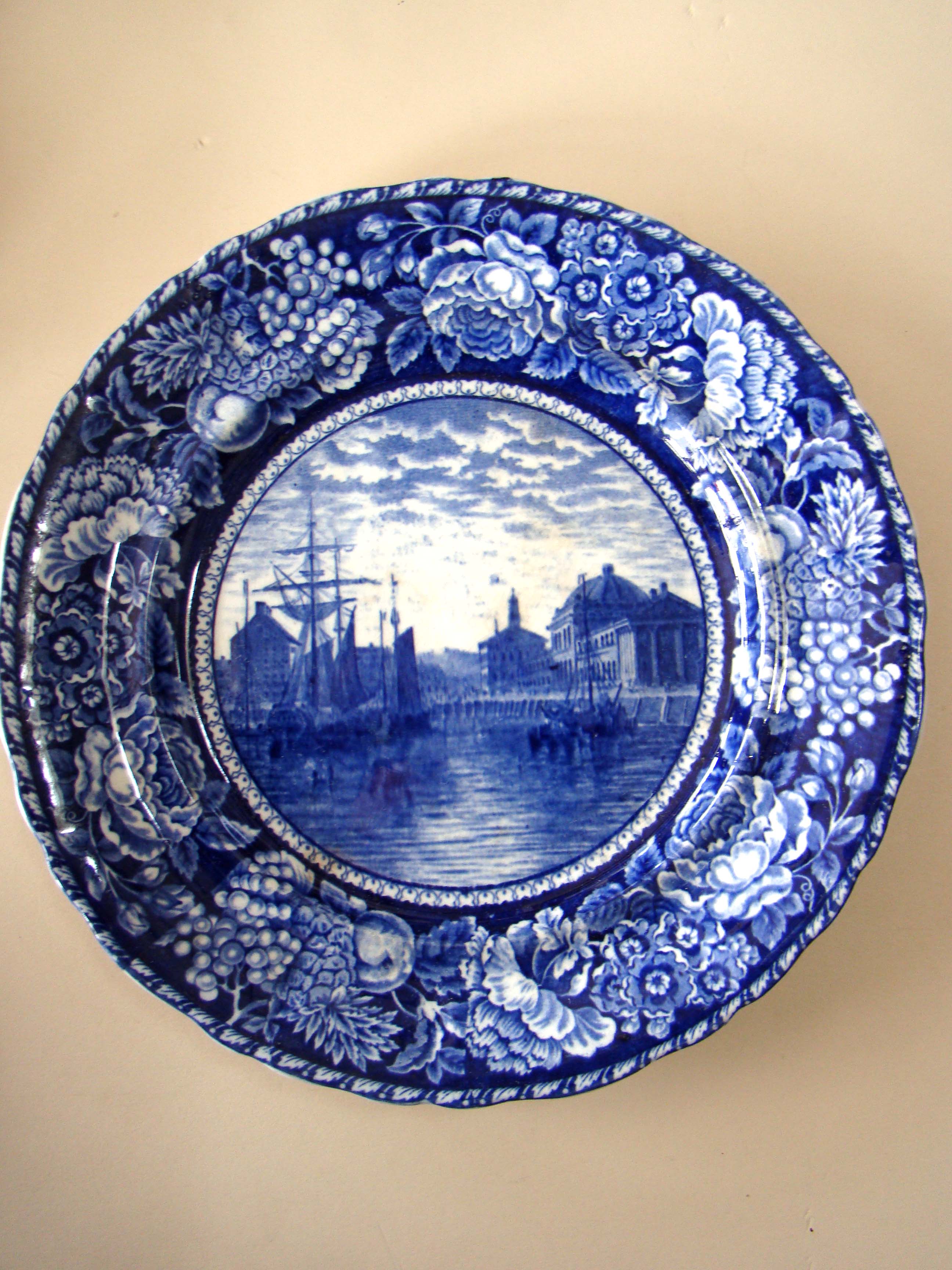 An historical Staffordshire plate depicting Faneuil Hall as seen from Boston harbor