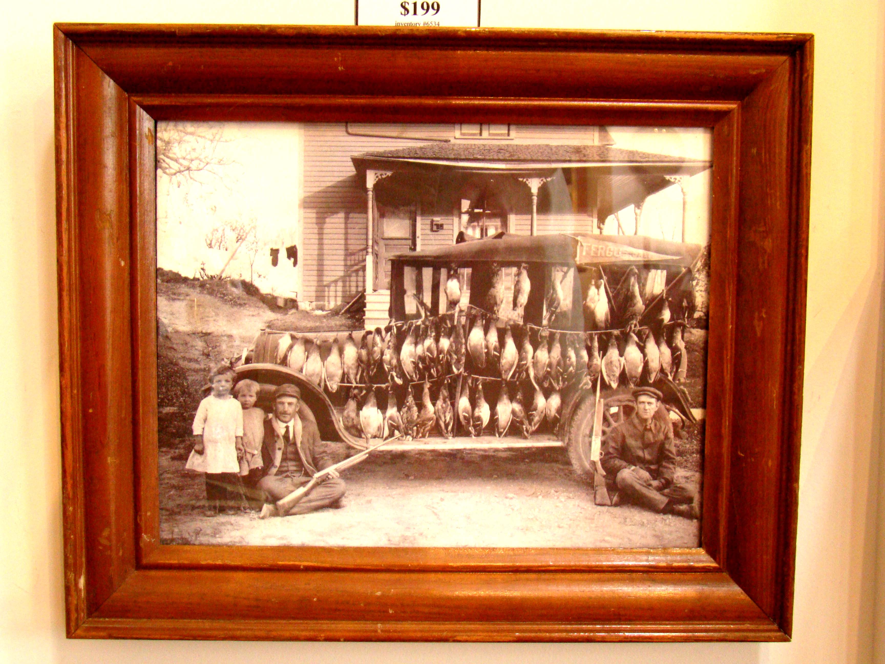 A wonderful early 20th century photo of duck hunters and their catch on display — image 2