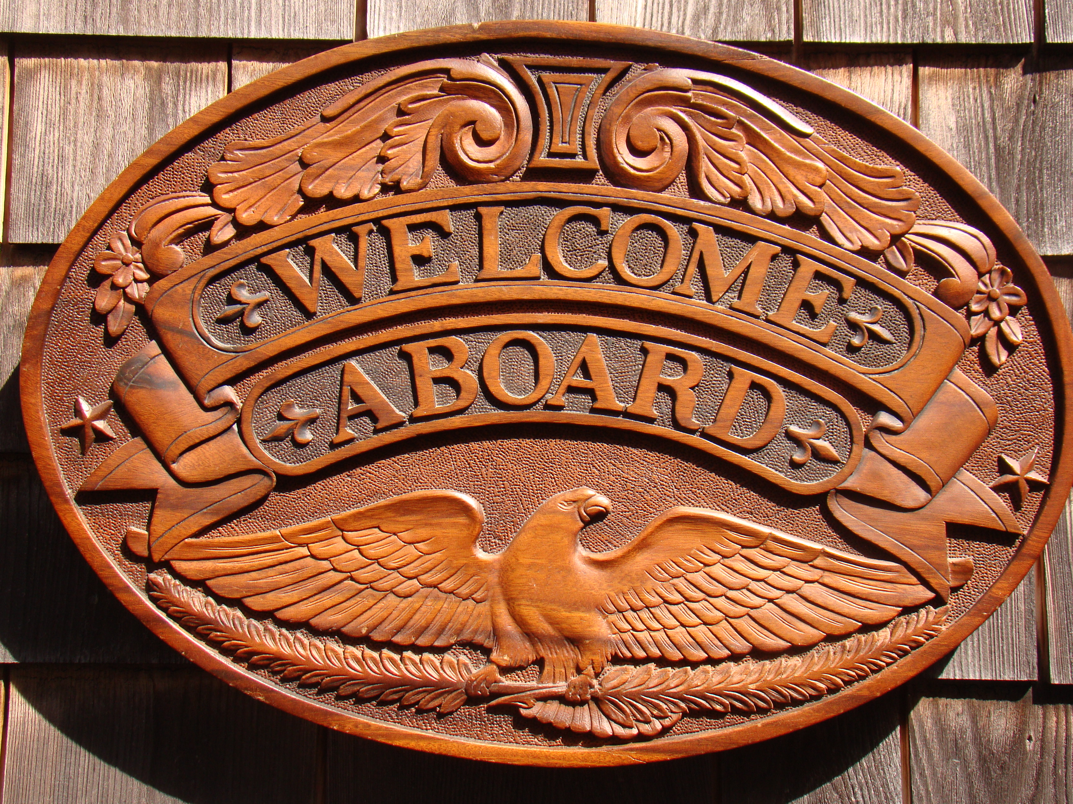 A  F A B U L O U S carved walnut WELCOME ABOARD sign with carved American eagle