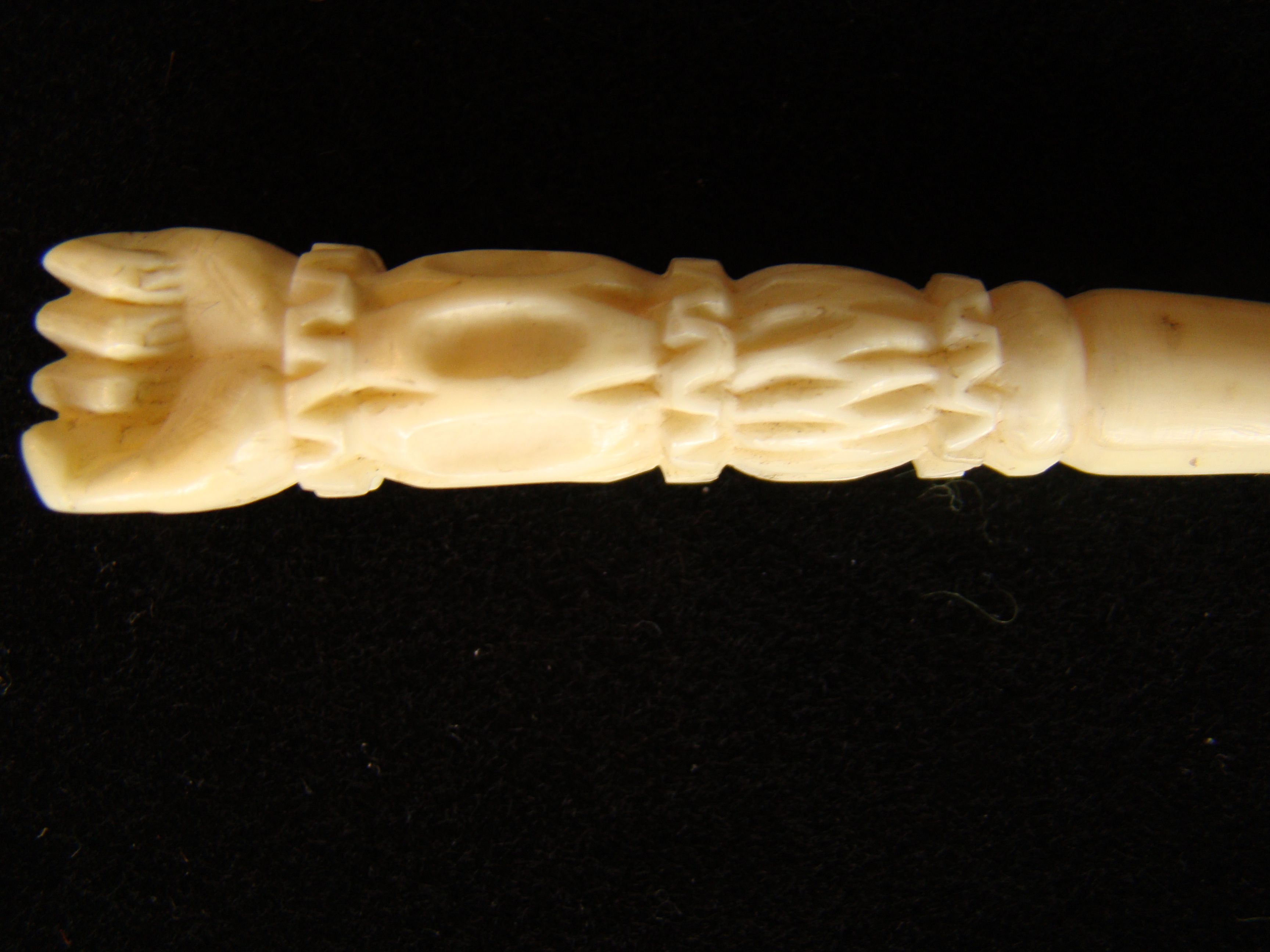 A fine and elaborately carved whale ivory bodkin circa 1850
