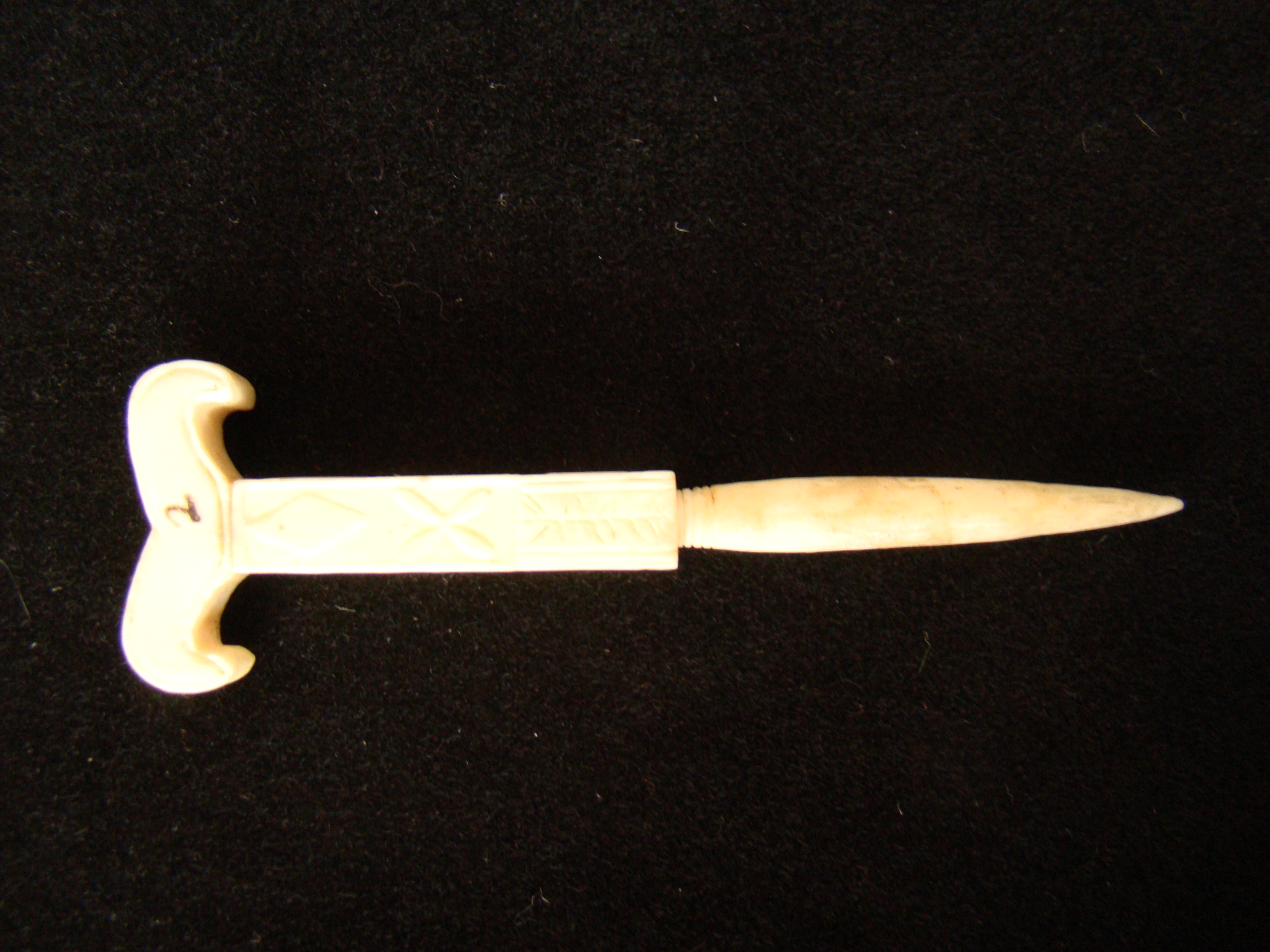 An unusual sailor-carved antique whale ivory bodkin in the form of a yoke circa 1850 — image 2