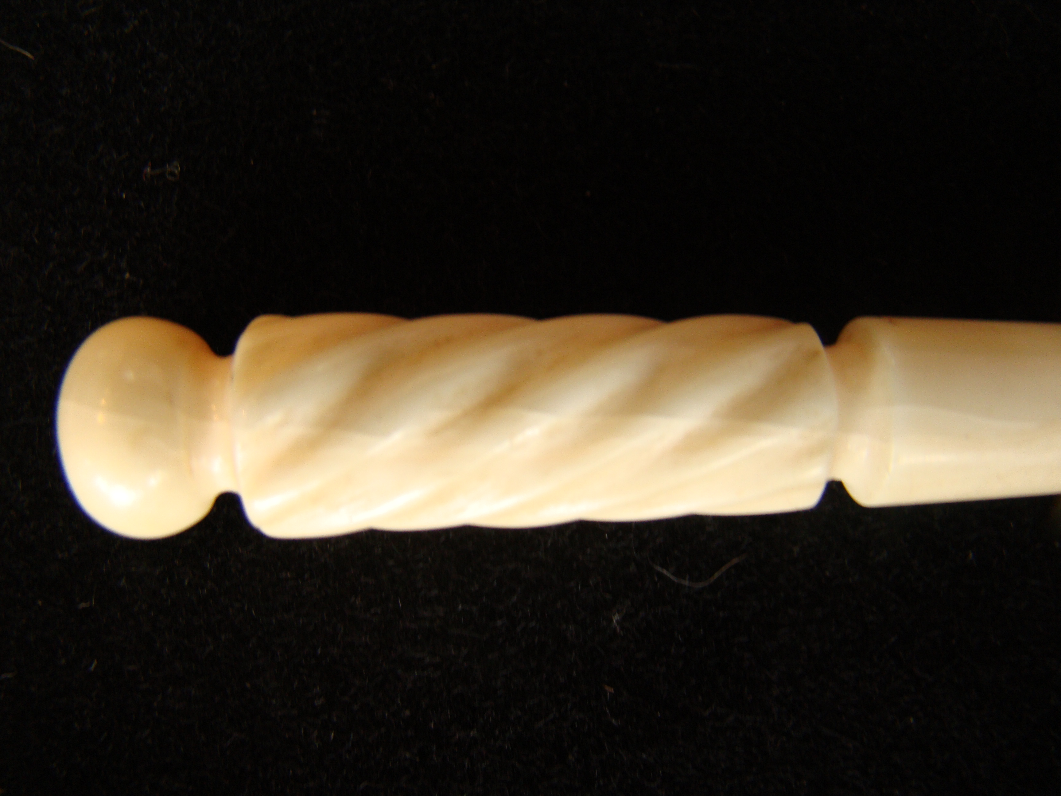 A fine antique whale ivory bodkin with barley twist handle circa 1850
