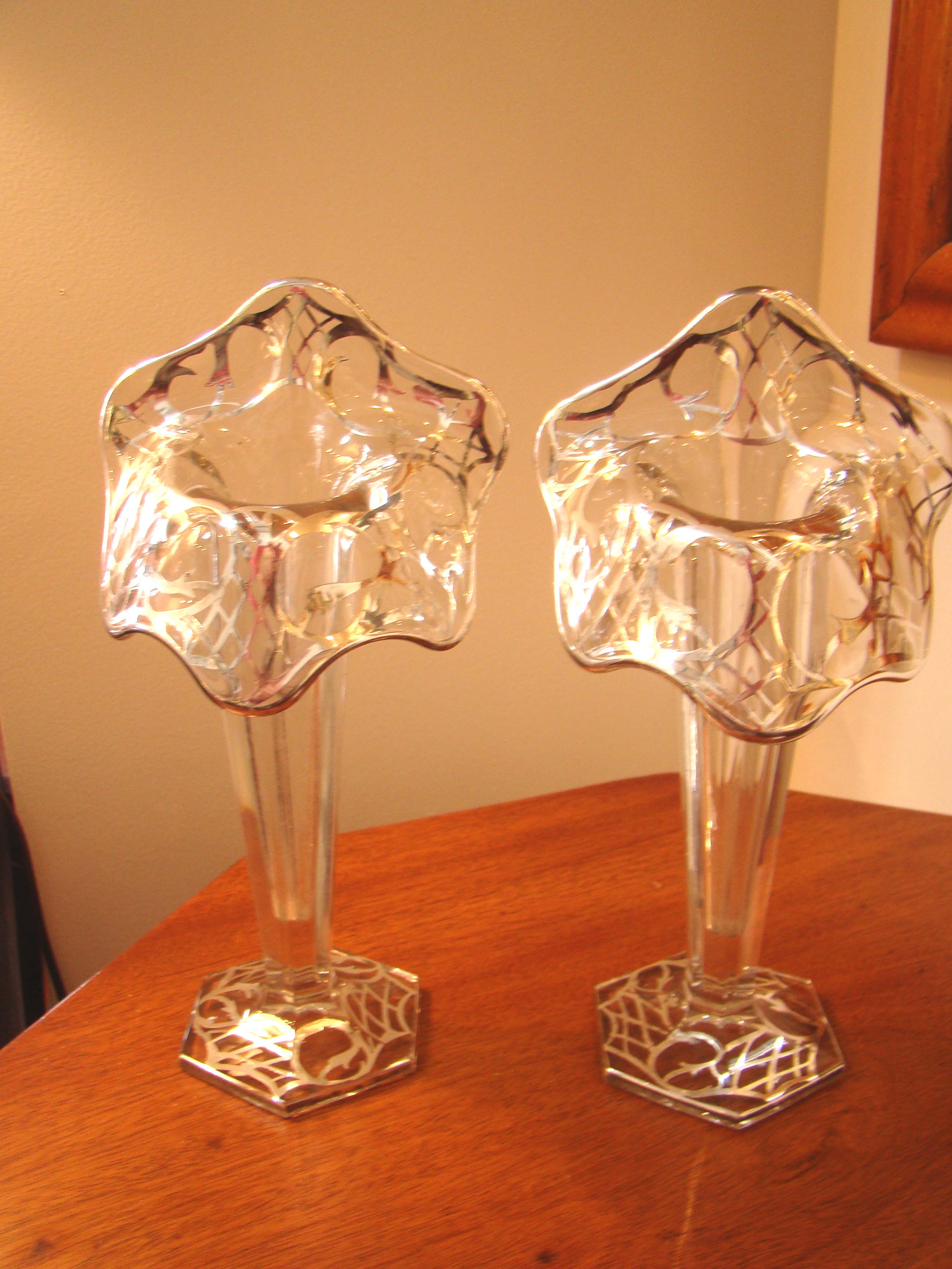 A fabulous pair of vintage silver overlay tulip vases circa 1900-1920.